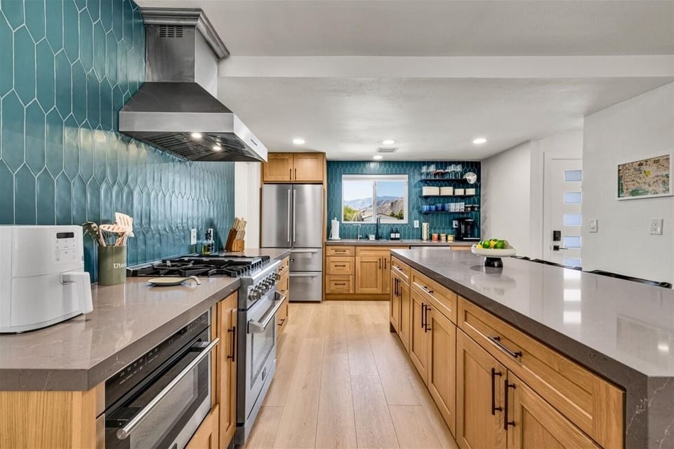 Modern kitchen with mountain views and premium appliances