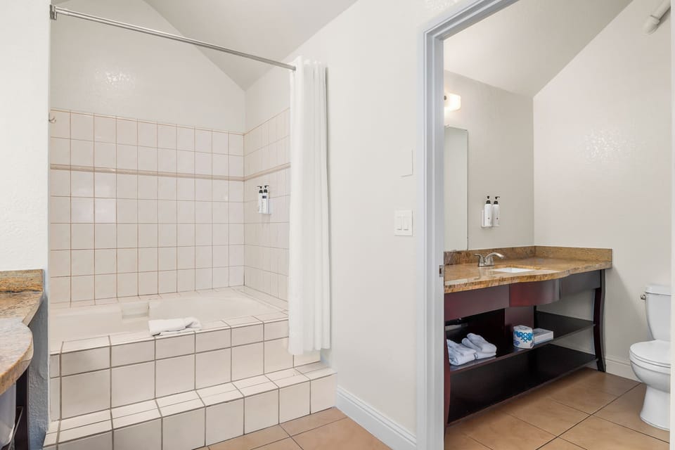 Private oversized soaking tub — your in-room spa experience