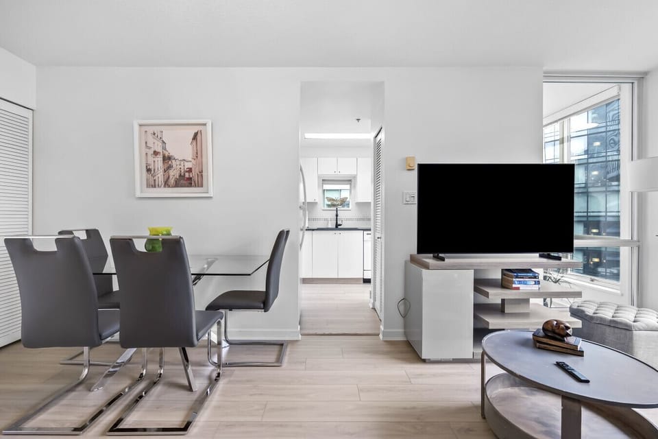 Dining Area: Sleek modern design with chic furniture and bright natural light—perfect for gathering!