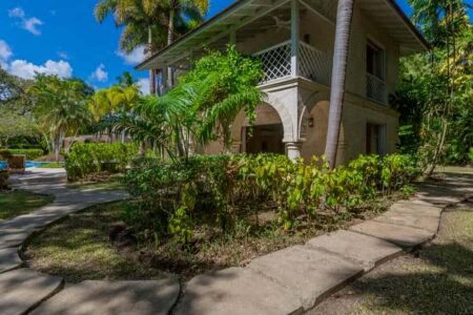 Exterior of Bluff House and Cottage with substantial gardens.