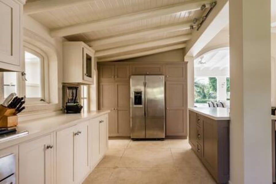 The well appointed kitchen where the property's chef is available 8 hours each day to create meals of your choice.