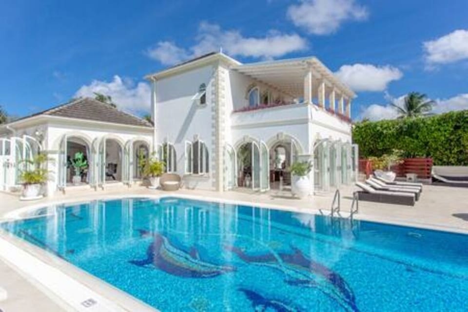 Fabulous private swimming pool with built in steps and several seating and lounging options.