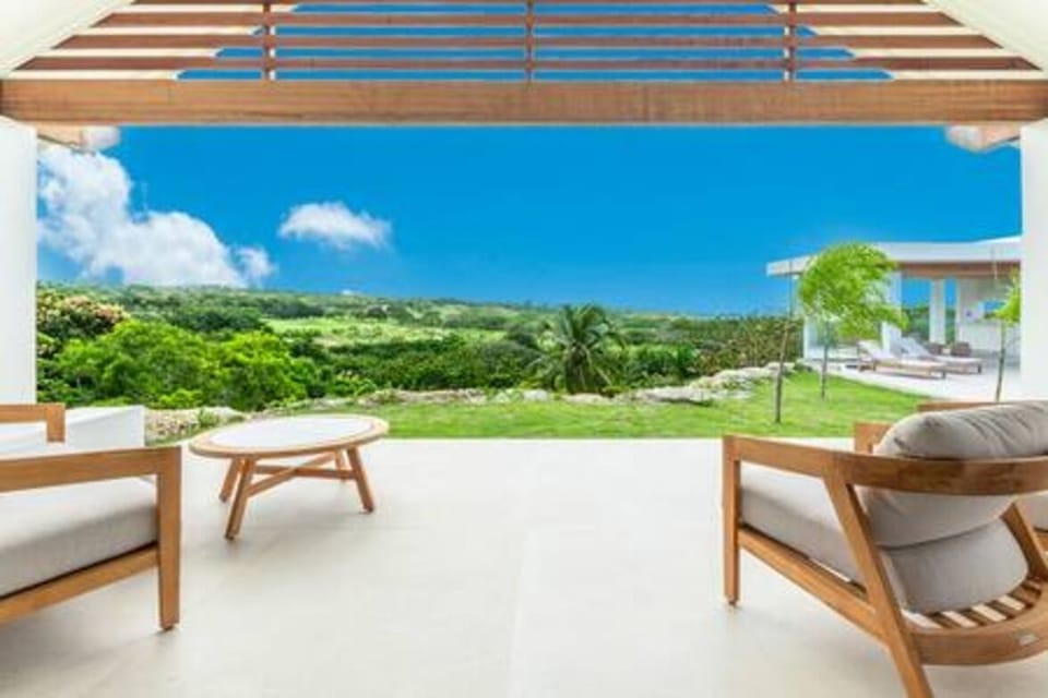 Sitting perched on the ridge with enviable views is Cloud Break Villa with private pool, modern gazebo and refreshingly modern and spacious interiors.