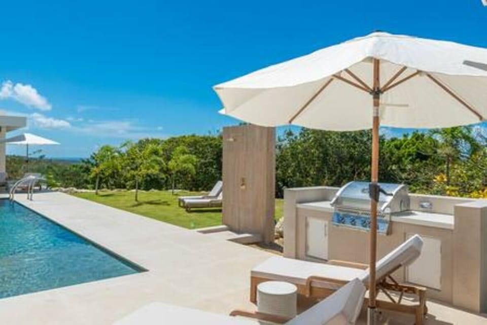 Sitting perched on the ridge with enviable views is Cloud Break Villa with private pool, modern gazebo and refreshingly modern and spacious interiors.