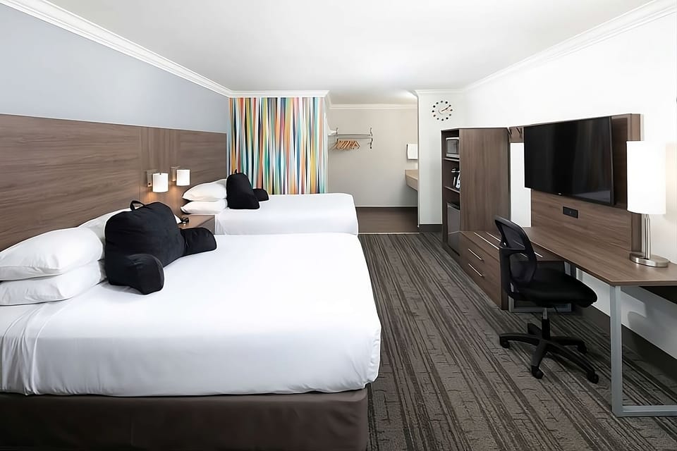 Settle into a bright double-queen room made for families.