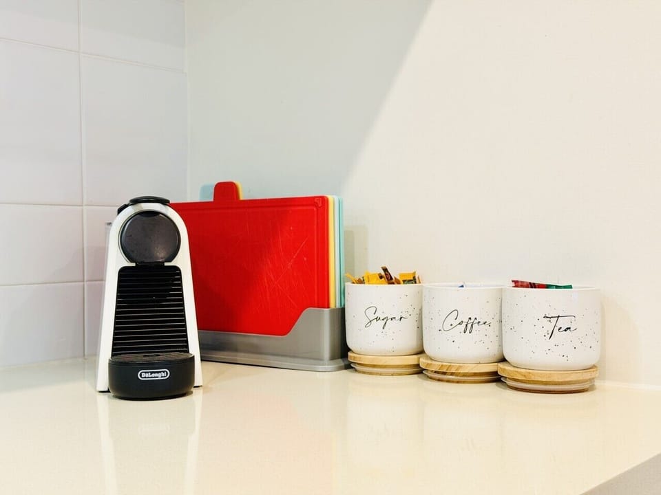 Complimentary Nespresso coffee, tea and pantry essentials provided.