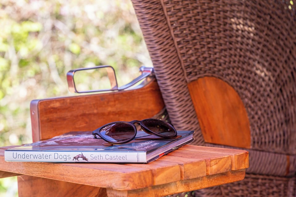 Terrace with table, book, and sunglasses