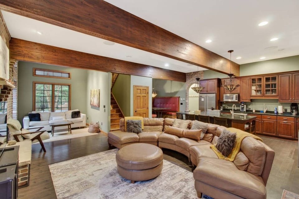 Open great room and kitchen — the whole group in one space.