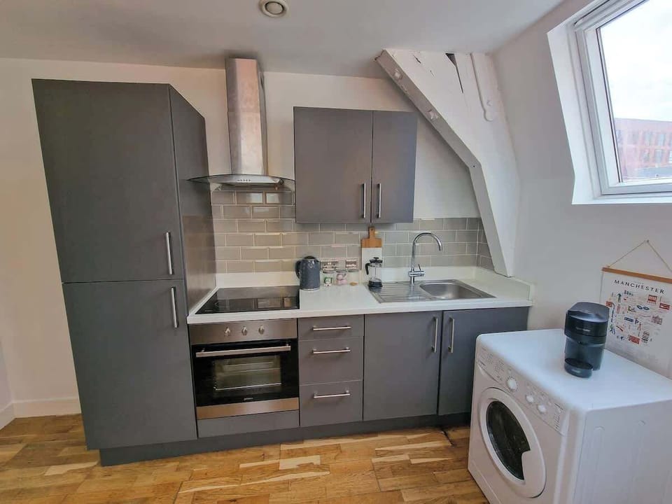 Fully equipped kitchen with washing machine so you can pack light and travel easy