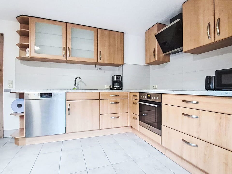 Cabinetry, Wood, Countertop, Interior Design, Kitchen, Furniture, Flooring, Drawer, Kitchen Appliance, Major Appliance