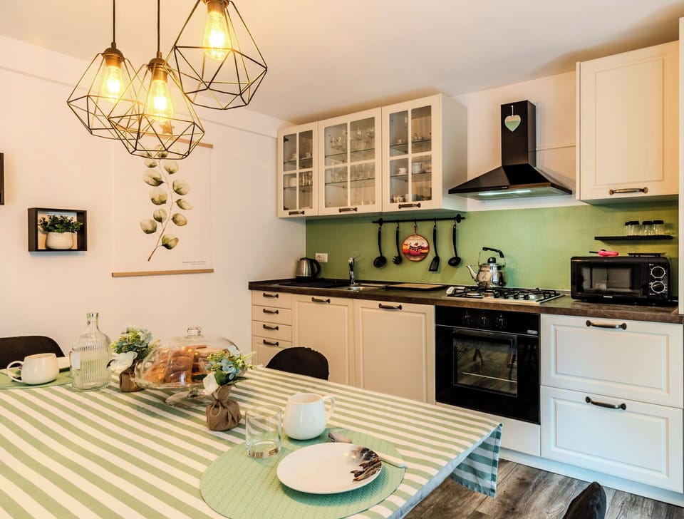 Furniture, Interior Design, Kitchen, Countertop, Light Fixture, Wood, Flooring, Ceiling, Room, Kitchen Appliance