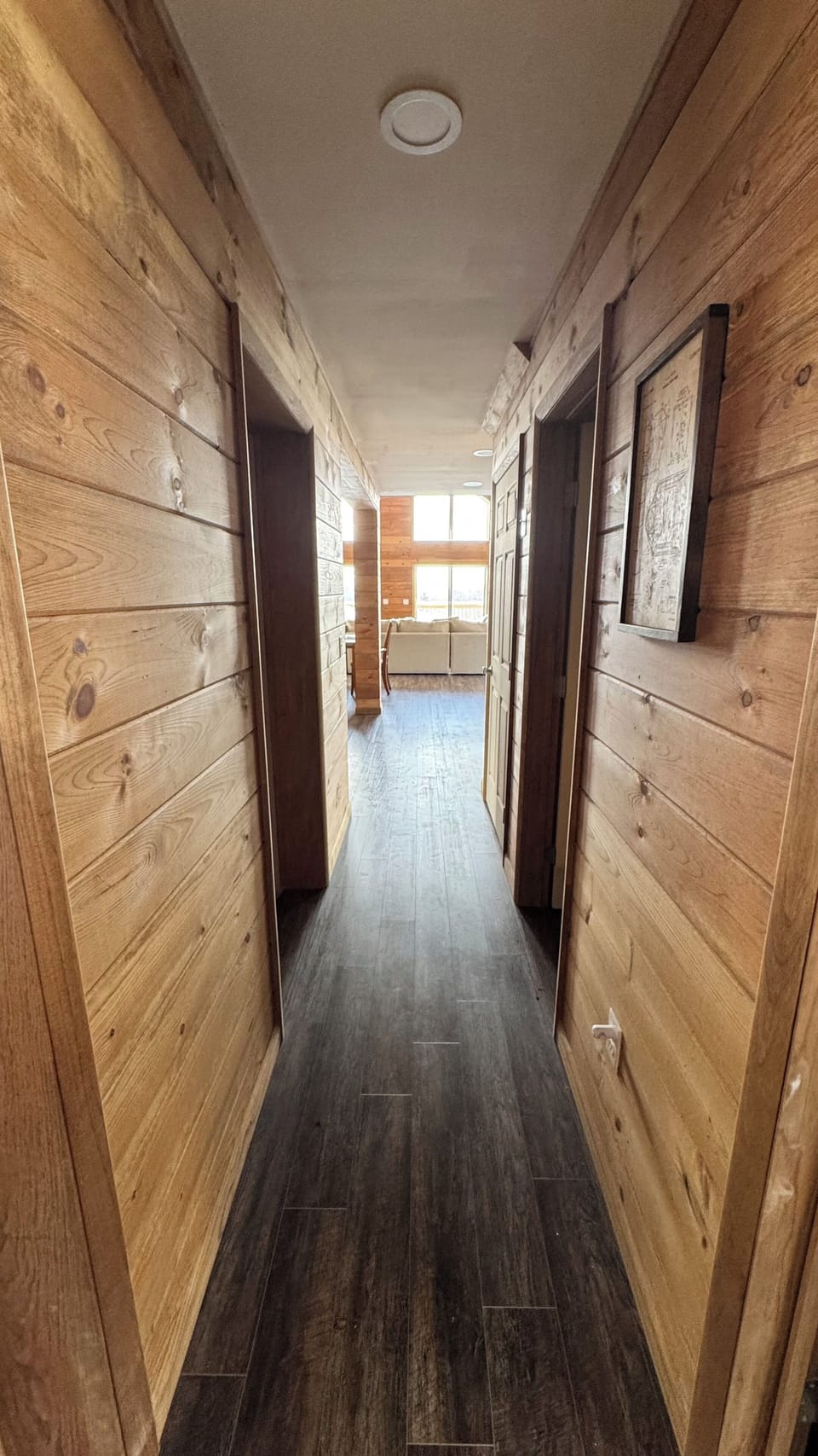 Hallway from the bedrooms leading into the great room.