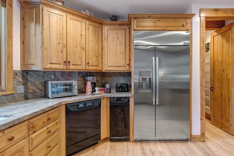 Sleek stainless steel fridge—holds all your favorite foods