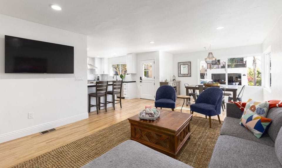 Open Living Space with Smart TV & Dining Area