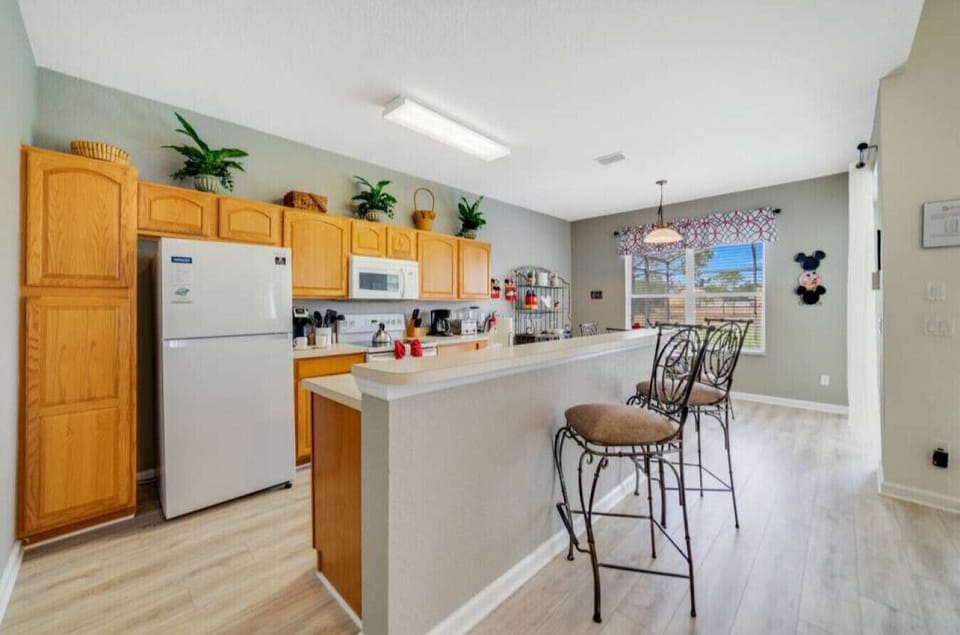 Enjoy cooking in this bright kitchen with plenty of counter space.
