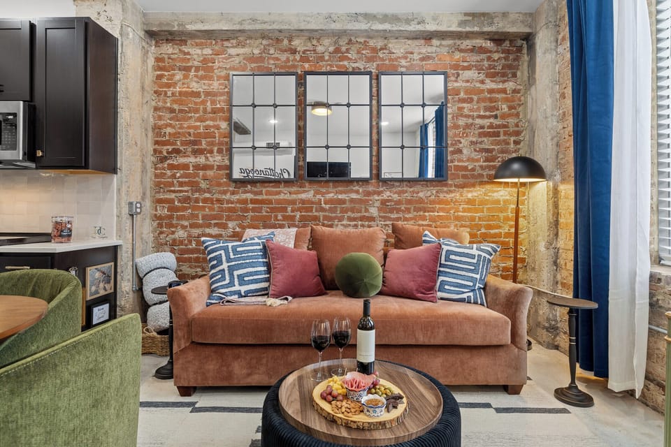 Pour a glass, open the charcuterie, and stay a while — the living room is designed for exactly this kind of evening.