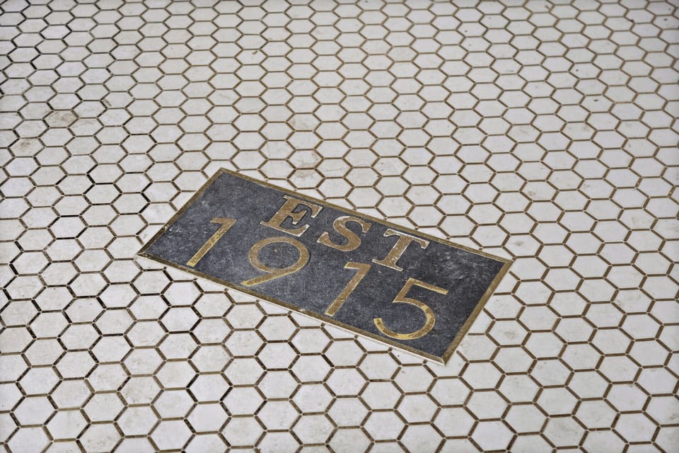 Est. 1915. Over a century of history under your feet — and free, secured parking waiting for you right outside.