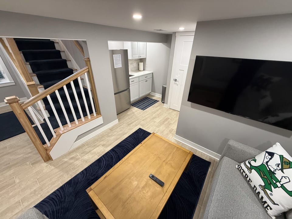 Lower Level: Family room, kitchenette and wide screen TV