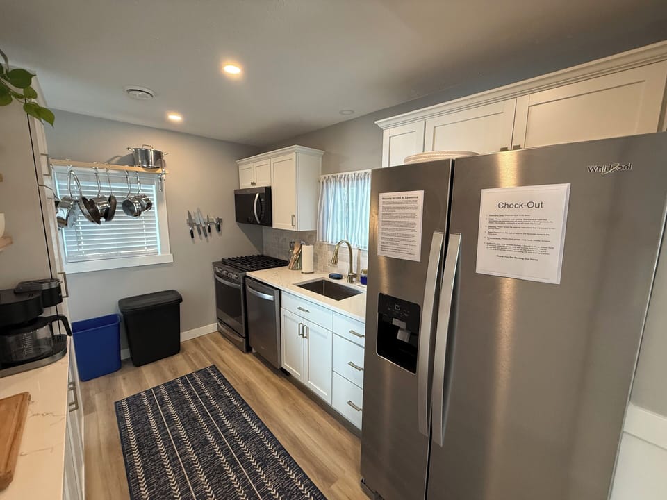 1st Floor Kitchen with SS appliances and quartz counter tops
