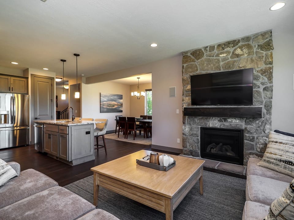 Open-concept living area with fireplace and comfortable seating