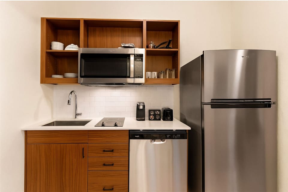 Cook and snack anytime with a sleek, fully equipped kitchenette.