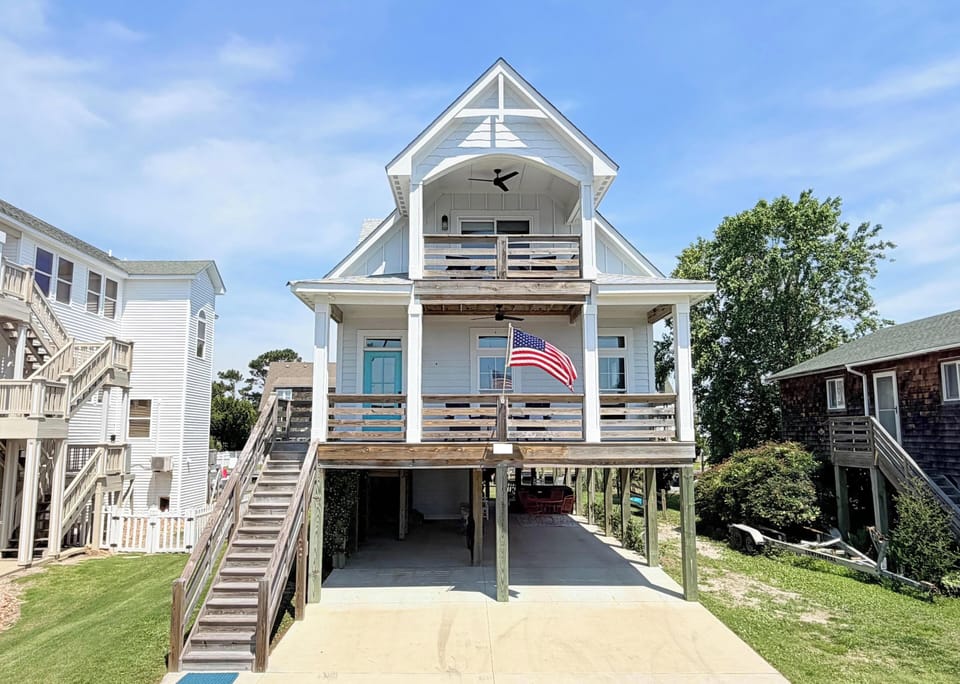 The Coast Guard station inspired home has plenty of free parking (up to 4 cars).