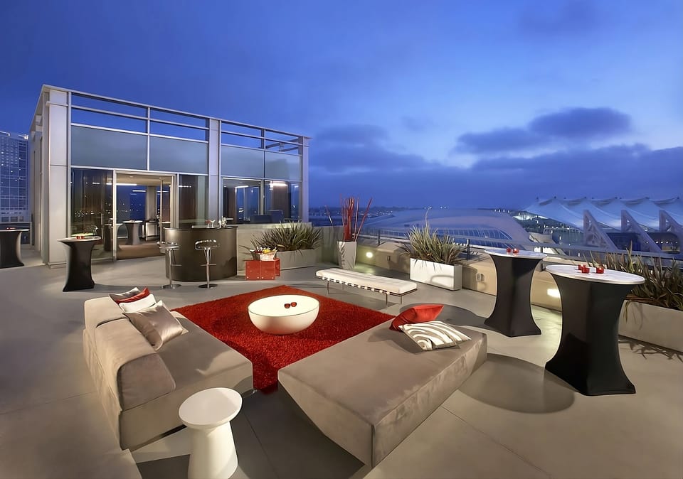 Unwind on the rooftop lounge with sweeping skyline views.