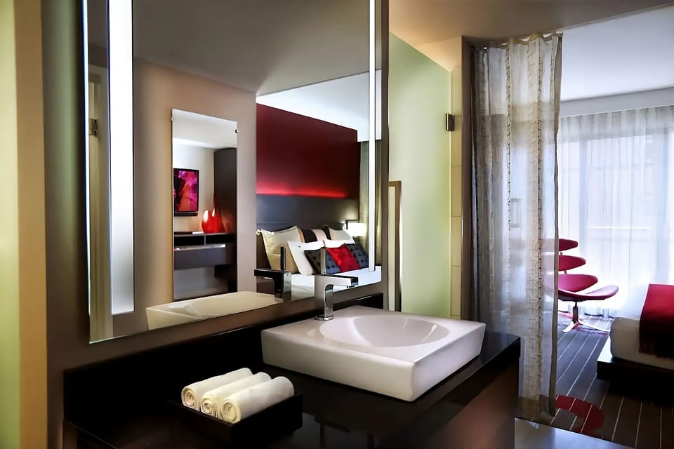 Get ready in style with open-concept sink and soft lighting.