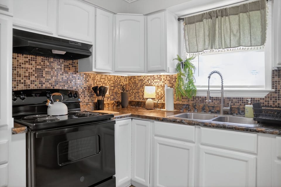 Full kitchen for preparing meals when not dining out at Ocean Springs hotspots 