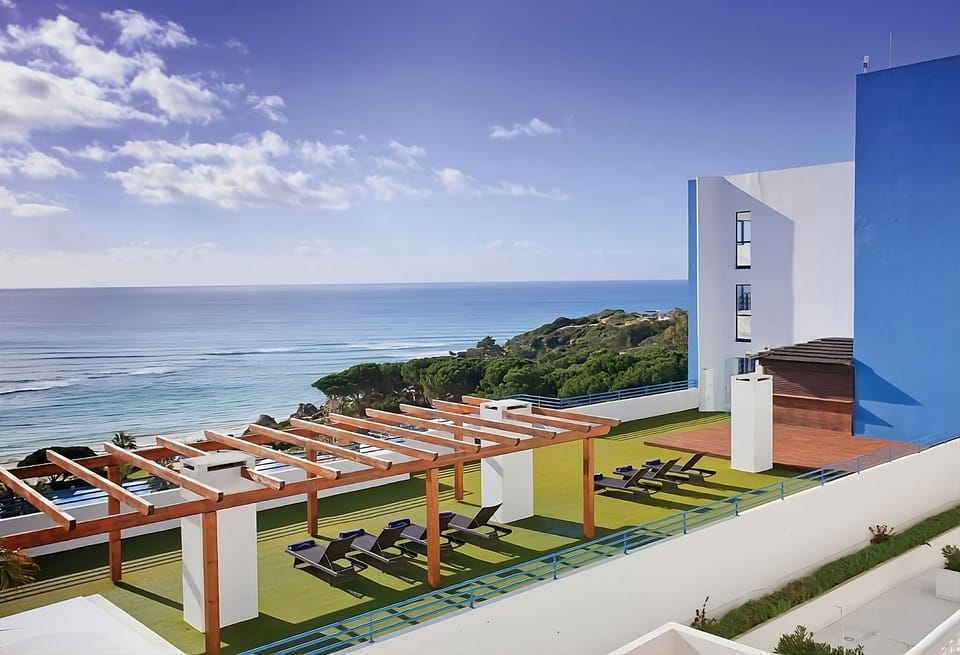 Soak up sunshine on the oceanfront deck with loungers.