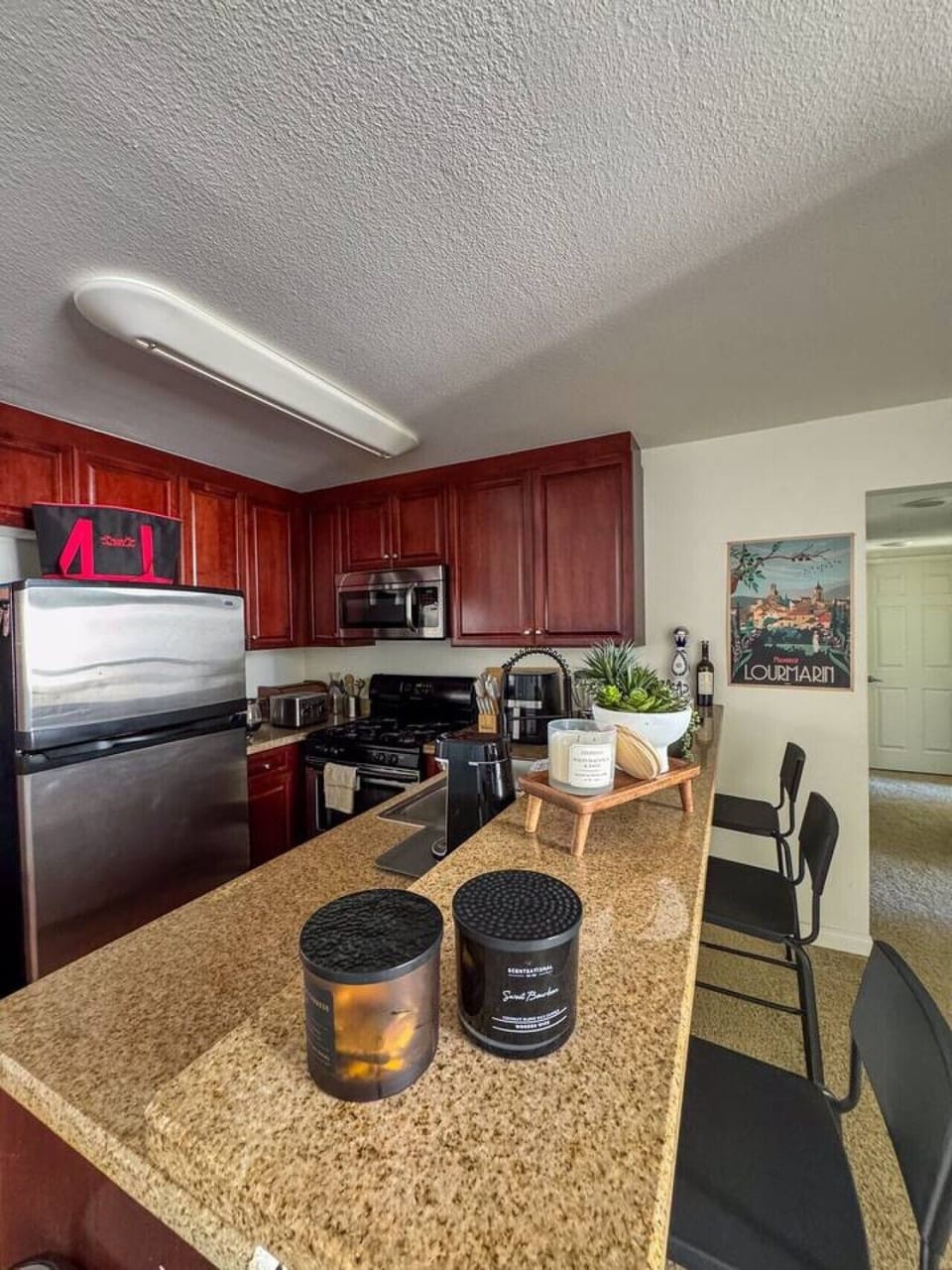 Fully equipped kitchen with stainless steel appliances, plenty of counter space, and everything you need for home-cooked meals during your stay.