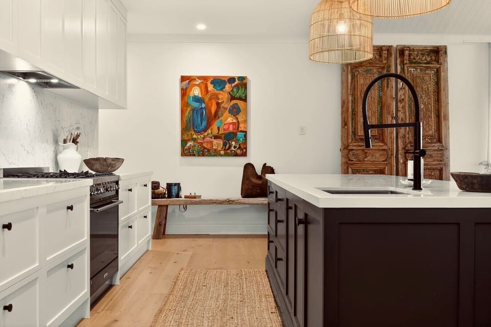 Modern farmhouse kitchen with premium finishes and ample space.