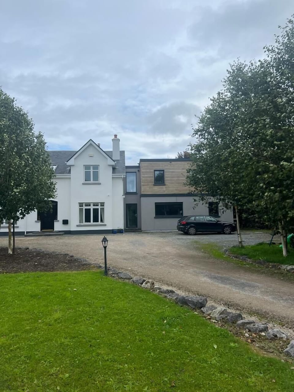The self-contained, private accommodation is in the wooden portion of the house.