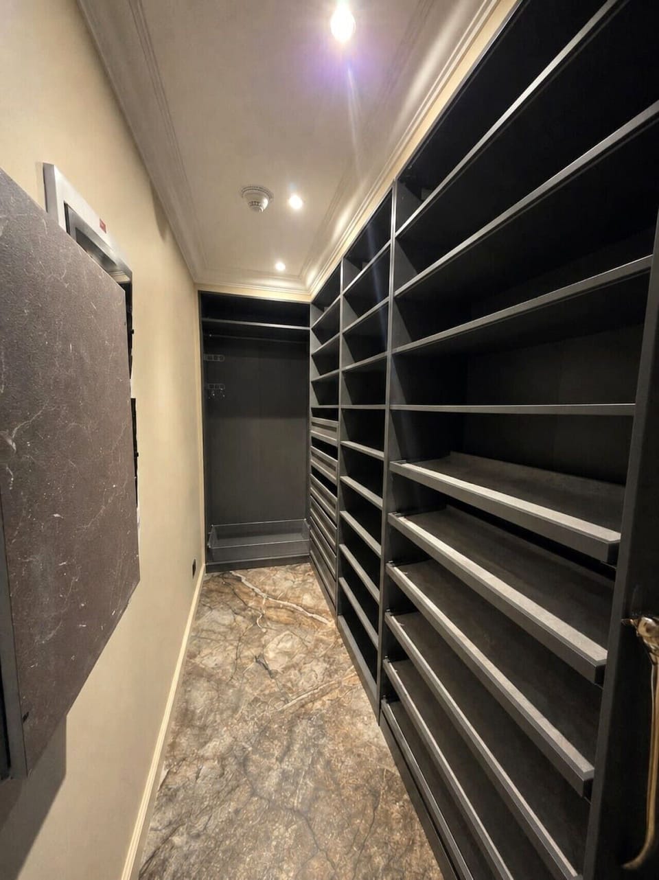 Kitchen pantry with floor-to-ceiling fitted shelving