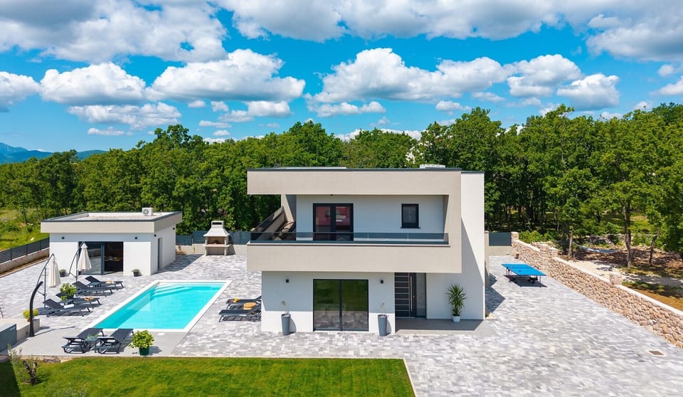 Enjoy the 32 sqm heated swimming pool with a spacious sun deck and outdoor shower.