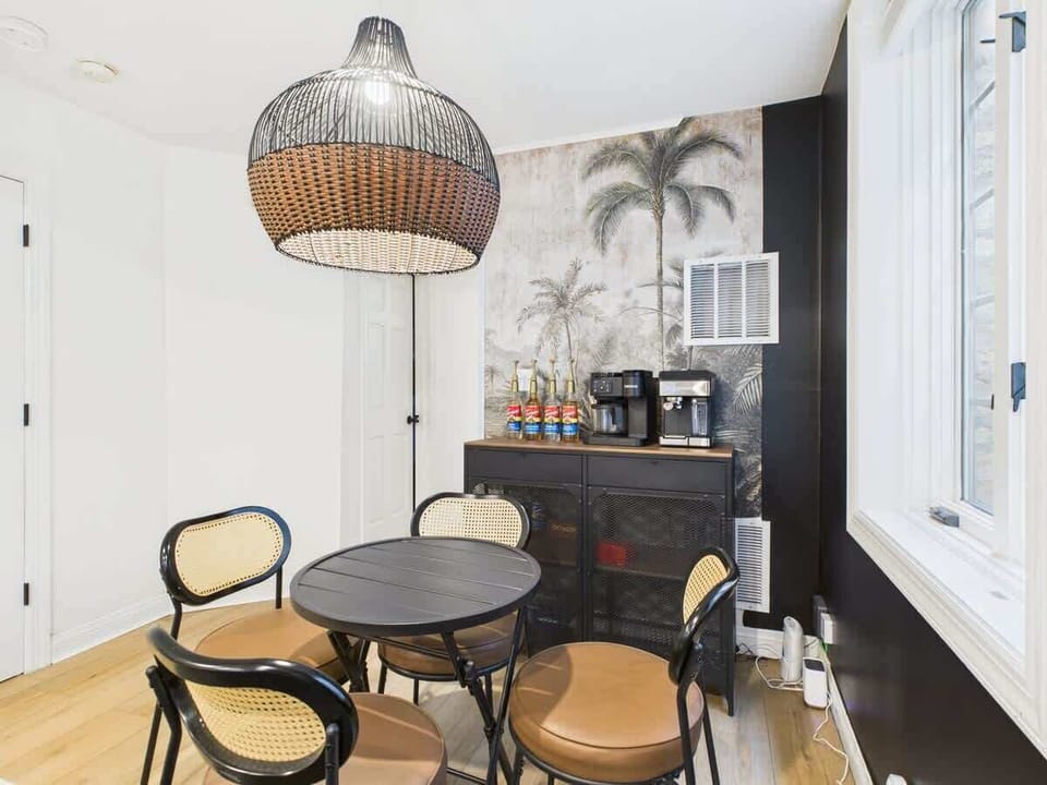 Dining Nook: Chic decor and a vibrant coffee station await your culinary adventures!