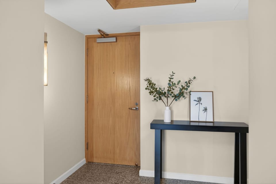 Arrive to a calm entry space with clean lines and thoughtful modern touches throughout.