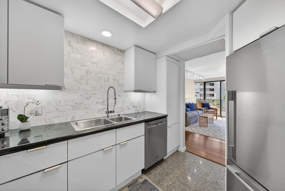Whip up island breakfasts in the refreshed kitchen with sleek finishes and ample storage.