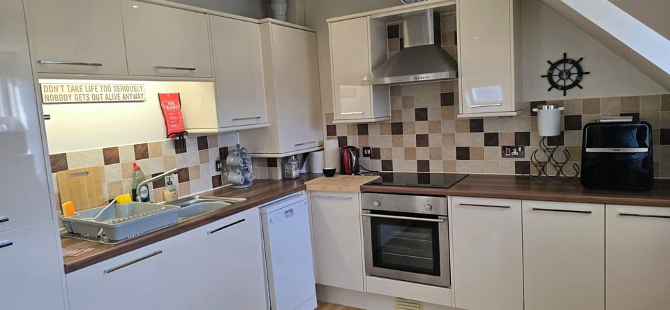 Fully fitted with all modern conveniences including a pod coffee maker