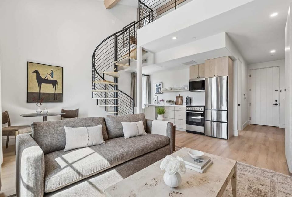 Cozy living area with sofa and TV
