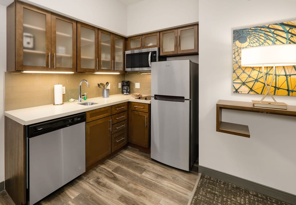 Fully stocked kitchen area ready for self-catering and home cooking.