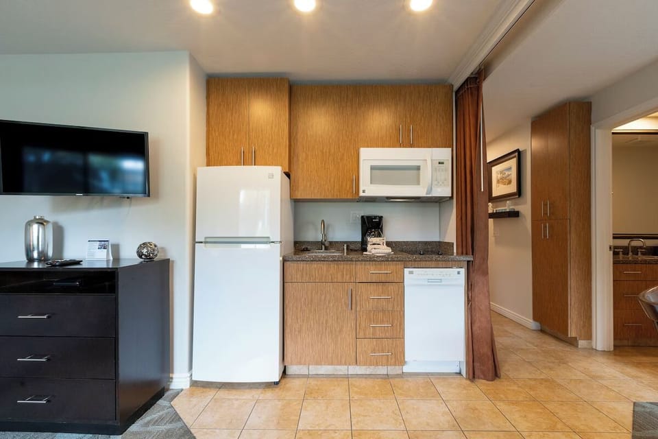 Cook easy meals with a full kitchen and bright lighting.