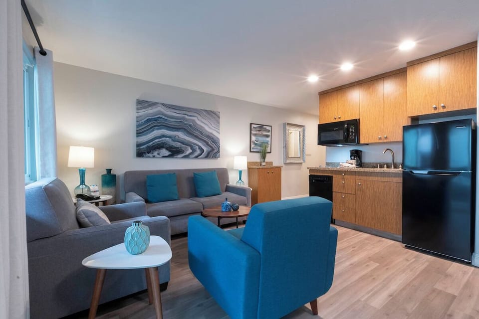 Gather for movie nights in a stylish open-concept suite.