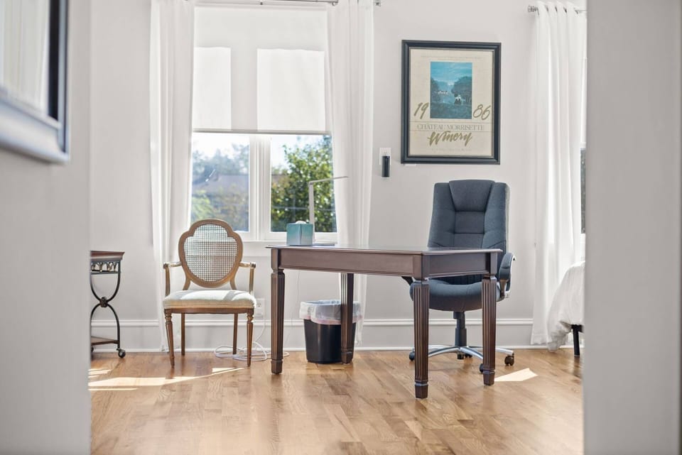 Spacious Atlanta retreat featuring designer bathrooms, a dedicated workspace, open-concept living, and upscale finishes.
