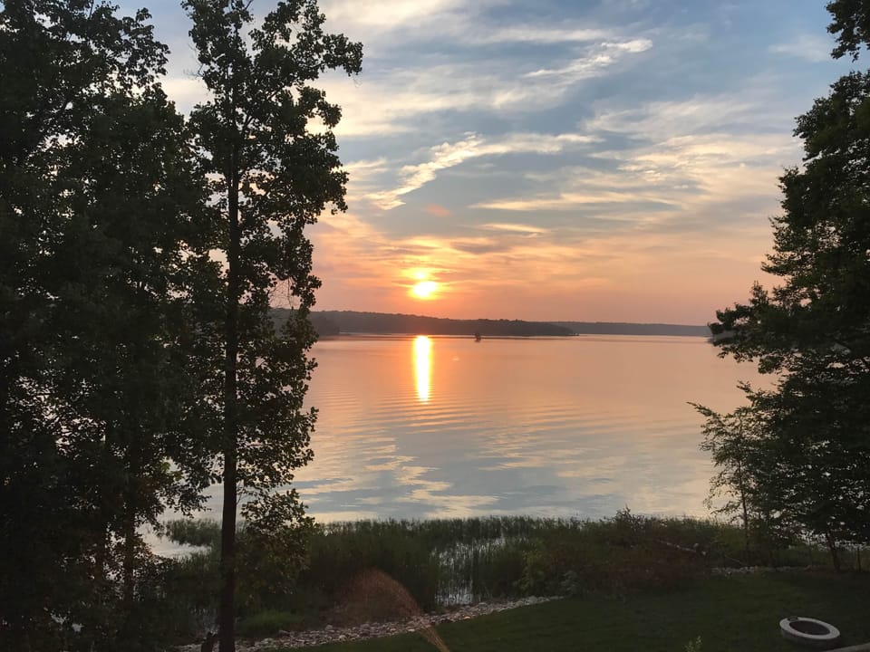 Sunrise on the Lake Anna from the waterfront Luxury Log Home
