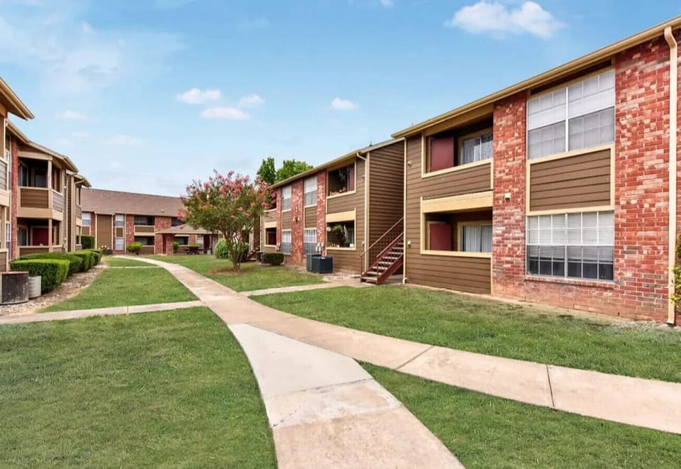 Well-maintained community with landscaped walkways and greenery.