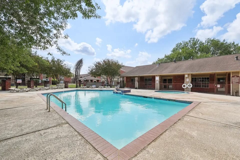 Enjoy sunny afternoons by the sparkling community pool.