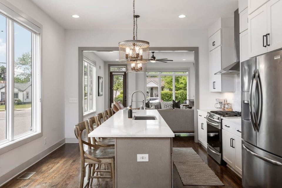 Fully-stocked, modern kitchen suitable for any chef! We provide all the essential supplies and utensils you`ll need for your morning coffee routine and any other cooking adventures. Kitchen island has seating for 5.