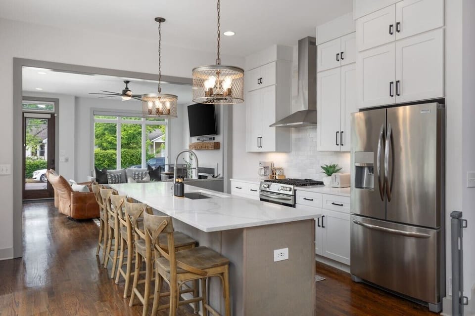 Fully-stocked, modern kitchen suitable for any chef! We provide all the essential supplies and utensils you`ll need for your morning coffee routine and any other cooking adventures. Kitchen island has seating for 5.