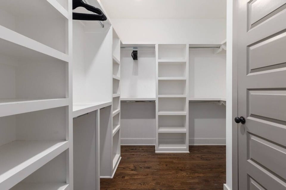 Huge walk in closet, connected to the primary bedroom.
